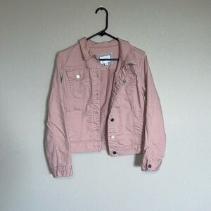 Pink Jean jacket, size is a medium and the color is a light pink